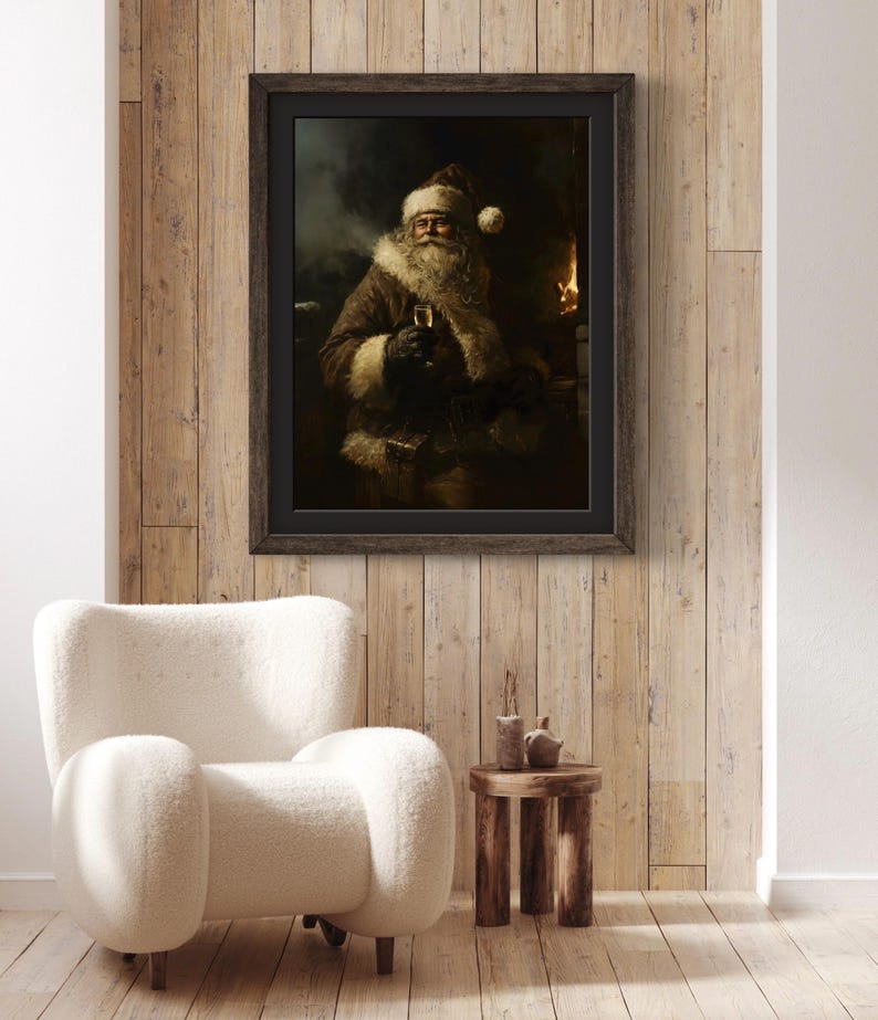 May include: A framed painting of Santa Claus sitting in a chair with a glass of wine in his hand. He is wearing a red hat and a white beard. The painting is set against a dark background with a fireplace in the background.