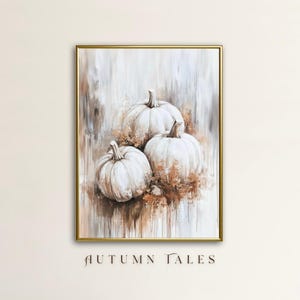 May include: A painting of three white pumpkins on a brown and white background. The pumpkins are arranged in a triangular shape, with the largest pumpkin at the bottom. The painting is titled "Autumn Tales".
