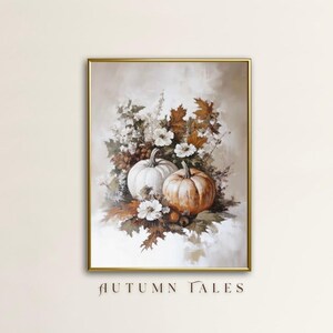 May include: A framed painting of a still life featuring two pumpkins, one white and one orange, surrounded by fall foliage and flowers. The painting is titled "Autumn Tales".
