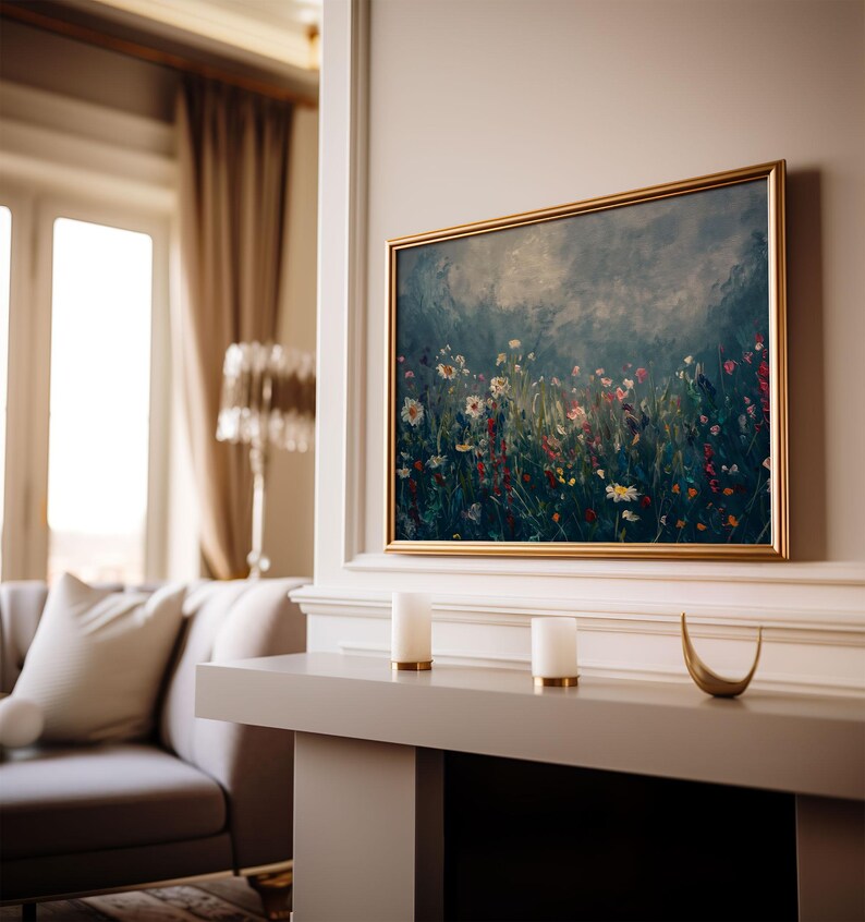a living room with a couch and a painting on the wall