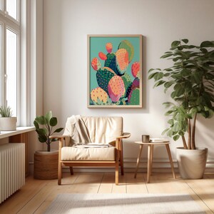 a living room with a couch and a painting on the wall