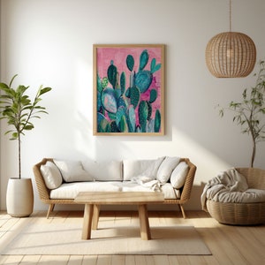a living room filled with furniture and a painting on the wall