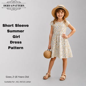 May include: A short sleeve summer dress pattern by DERYA PATTERN featuring a white fabric with a small yellow and blue floral print. The dress has a round neckline and a flared skirt. Text includes Short Sleeve Summer Girl Dress Pattern.