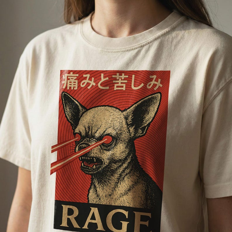 Vintage-style bootleg tshirt design featuring an angry chihuahua shooting red laser beams from its eyes, set against bold Japanese poster graphics with kanji text, distressed 90s aesthetic, and the word “RAGE” in large block letters. Perfect for fans of weirdcore, dreamcore, Harajuku fashion, and unhinged shirts. Printed on soft comfort colors cotton.
