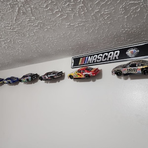 QTY 8 Nascar/collectable 1:24 scale car Floating shelf display stand. Hang your collection on the wall. Showoff your diecast cars.