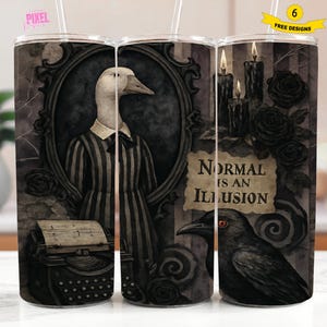 May include: A stainless steel tumbler with a gothic design. The tumbler features a duck in a striped suit, a raven, candles, and the text "Normal is an Illusion." The design is in shades of gray and black.