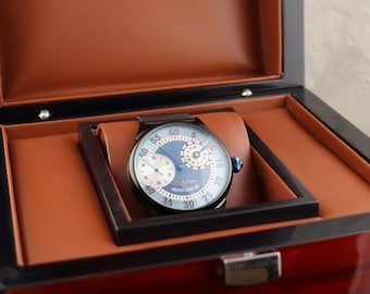 Boxed watch. The watch is in a gift box. Men's watches. Men's jewelry. Vintage gift. exclusive watch. An interesting gift for a man.