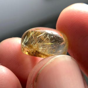 Natural 11.30 carats Golden Rutile Quartz cab from Africa 14.6x10.3x8.8mm