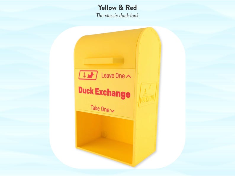 May include: A bright yellow Duck Exchange box with red lettering and a duck logo. The box has a curved top and a lower compartment. Text reads "Leave One" and "Take One".