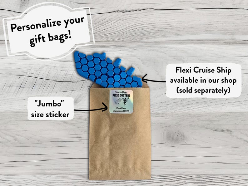 May include: A brown paper gift bag with a blue honeycomb-shaped sticker and a sticker that says "You've Been Pixie Dusted!"  The bag is labeled "Jumbo size sticker".  A separate sticker says "Flexi Cruise Ship available in our shop (sold separately)".