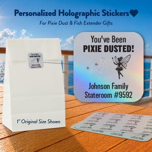 May include: A white paper bag with a square holographic sticker featuring a fairy graphic and the text "You've Been PIXIE DUSTED! Johnson Family Stateroom #9592". A sheet of identical 1-inch stickers is displayed alongside the bag on a wooden surface.