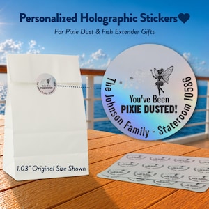 May include: Round holographic stickers featuring a fairy graphic, star accents, and the text 'You've Been PIXIE DUSTED!', 'The Johnson Family', and 'Stateroom 10586'. A white paper bag displays one sticker, with a 1.03-inch size reference noted.