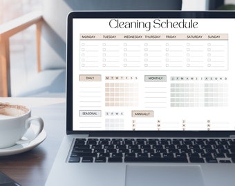 May include: A laptop computer displaying a cleaning schedule with a checklist for daily, weekly, monthly, seasonal, and annual tasks. The schedule includes days of the week and months of the year.