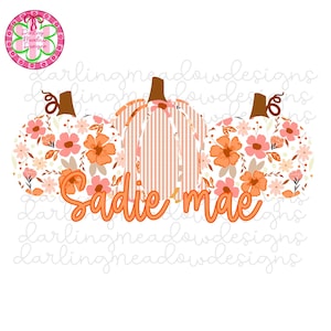 May include: A digital graphic featuring three pumpkins with brown stems. The outer pumpkins have a white background with orange and pink floral patterns. The center pumpkin has orange and white vertical stripes. The text Sadie mae is in orange.