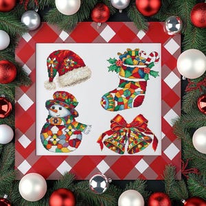 May include: A framed Christmas cross-stitch sampler featuring a Santa hat, stocking, snowman, and bells. The designs are colorful and geometric, with a red and white gingham frame. The background includes Christmas ornaments and greenery.
