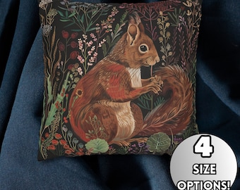 May include: A throw pillow with a dark background featuring a detailed illustration of a squirrel surrounded by colorful flowers and foliage.