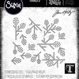 May include: Sizzix Thinlits die set featuring pine cone and branch designs. The set includes 13 embossing dies for paper crafting. The design is by Jim Holtz. The package has a black and white color scheme.