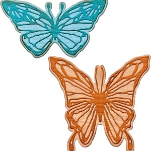 May include: Two decorative butterfly cutouts, one blue and one orange, with intricate wing designs.