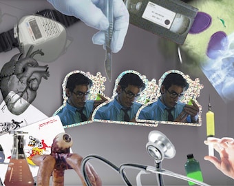 May include: A collage featuring medical and scientific imagery. Elements include a grayscale heart, playing cards, laboratory flasks, a stethoscope, a VHS tape, and a person holding a syringe. The image has a surreal, artistic quality.