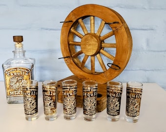 Vintage Mexican style rustic wooden roulette with bottle gun and 6 shot mexico