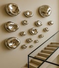 Modern Mirror Wall Art Set \u2013 Hand-Blown Silver Glass Pebble Sculptures, Organic Shapes for Luxury Minimalist Home D\u00e9cor product logo