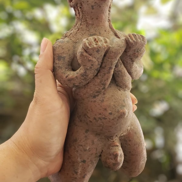 Pachamama, ancient ancestral figure, pregnant woman, clay woman sculpture birth of baby