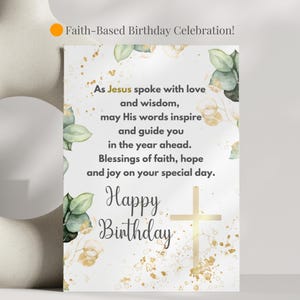 May include: A white card with gold and green watercolor designs. The card has a cross and the text "As Jesus spoke with love and wisdom, may His words inspire and guide you in the year ahead. Blessings of faith, hope and joy on your special day. Happy Birthday".
