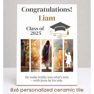 May include: A personalized ceramic tile with the text "Congratulations! Liam Class of 2025." The tile features a watercolor image of a figure walking towards a church. The text "He walks boldly into what's next - with Jesus by his side." is also included.