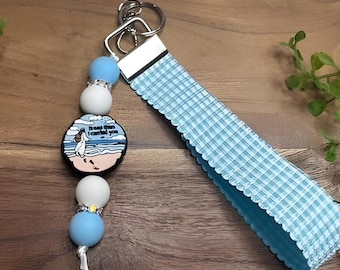 Blå gingham-nyckelring med inspirerande strandberlock – Present med havstema och pärlor till henne