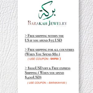 May include: A white card with the text "BARAKAH JEWELRY" and Arabic script above it. The card lists free shipping offers for purchases of $35, $80, and $400 USD, with associated coupon codes.
