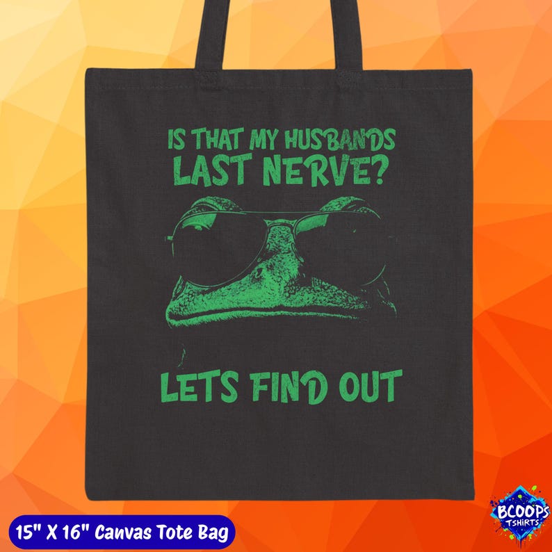 A bold green frog in sunglasses with the phrase “Is That My Husband’s Last Nerve? Let’s Find Out.” Printed large and centered on a canvas tote bag, this design brings playful humor to everyday use—great for gifting, groceries, beach gear, or daily essentials.