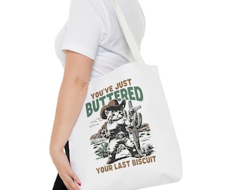 Grappige draagtas cowboy kat: sarcastisch 'Buttered Your Last Biscuit'-ontwerp