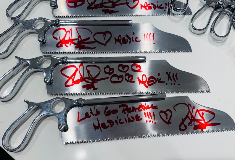 Stainless Steel Bone Saw signed by Robin Atkin Downes Medic From Team Fortress 2 image 4