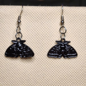 small black moth earrings