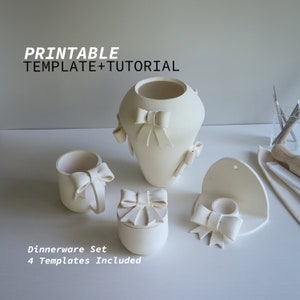 May include: A cream-colored ceramic dinnerware set featuring a vase, mug, small container, and wall-mounted holder, all adorned with bow-shaped embellishments. The image includes the text "PRINTABLE TEMPLATE+TUTORIAL" and "Dinnerware Set 4 Templates Included."