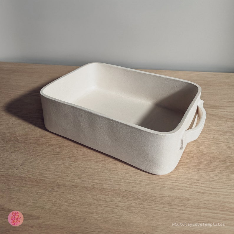 May include: A rectangular off-white baking dish with rounded corners and a handle on the side. The surface has a matte, textured finish. The text CutClayLoveTemplates is visible in the bottom right corner, and a circular logo is in the bottom left.