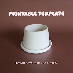 May include: A white ceramic planter with a matching saucer. The planter has a rounded shape and a wide opening. Text at the top reads "PRINTABLE TEMPLATE" and at the bottom "INSTANT DOWNLOAD ~ DIY POTTERY".