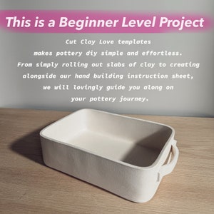 May include: A rectangular off-white ceramic baking dish with two side handles. The text reads: This is a Beginner Level Project. Cut Clay Love templates makes pottery diy simple and effortless. From simply rolling out slabs of clay to creating alongside our hand building instruction sheet, we will lovingly guide you along on your pottery journey.