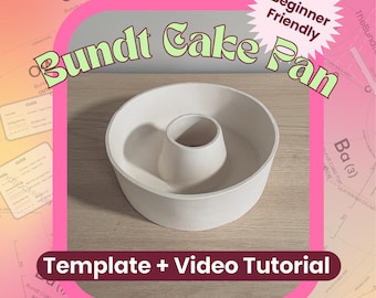 May include: A white, circular, hollow-center bundt cake pan with a central tube. The image includes text that reads: "Bundt Cake Pan", "Beginner Friendly", and "Template + Video Tutorial" against a pink and white graphic background.