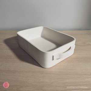 May include: A rectangular off-white baking dish with rounded corners and two side handles. The surface has a matte, textured finish. The text CutClayLoveTemplates is visible in the bottom right corner, and a circular logo is in the bottom left.