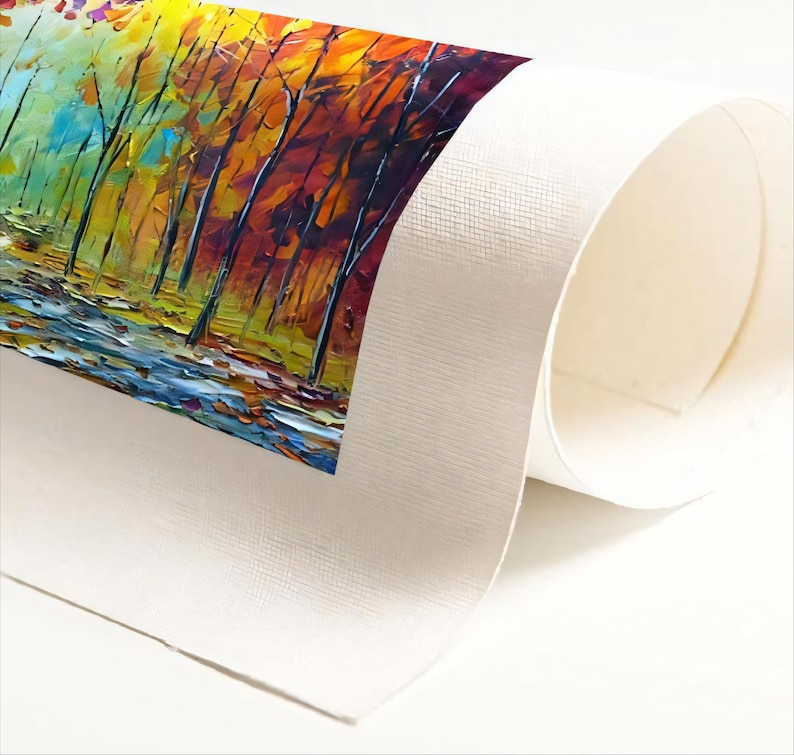 The image is a close-up of a piece of paper with a vibrant painting of a forest scene on it.