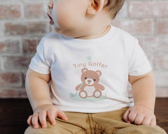 ゴルフテディベアベビーTシャツ、パステルカラーのスポーツベビーシャツ、男女兼用ベビーシャワーギフト、ゴルファーパパへのベビーギフト、かわいい男の子用ゴルフウェア