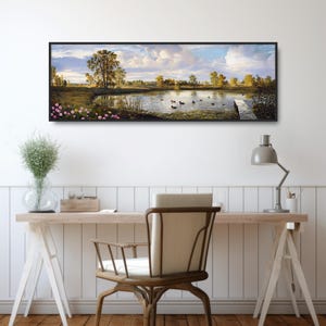 May include: A panoramic landscape painting of a lake with a wooden bridge leading to a small island. The lake is surrounded by trees and green grass. The sky is blue with white clouds. There are ducks swimming in the lake.
