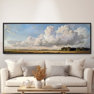 May include: A panoramic landscape painting depicting a field with a line of trees in the distance. The sky is dominated by large, fluffy white clouds against a blue background.