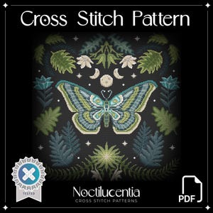 May include: Cross stitch pattern featuring a blue and green butterfly with a dark background. The pattern is surrounded by leaves, flowers, and stars. The text "Noctilucentia Cross Stitch Patterns" is at the bottom of the image.
