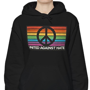 United Against Hate Hooded Sweatshirt | Peace Sweatshirt | Anti-Hate Hoodie | LGBTQ+ Pride Apparel | Gift for Activists | Rainbow Peace Sign