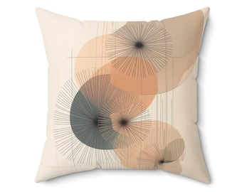 May include: Square throw pillow with a cream-colored background. The design features overlapping circles in shades of peach, gray, and beige, with radiating lines emanating from the center of each circle. The pillow has a minimalist, abstract design.