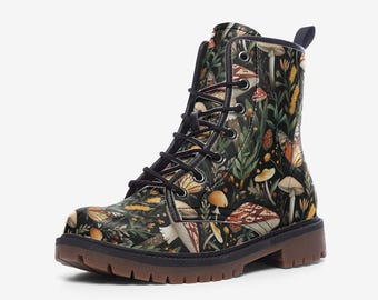 May include: Black leather combat boots with a colorful floral and mushroom print. The print features a variety of mushrooms, flowers, and butterflies.