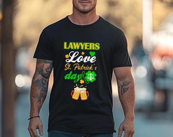 May include: A black t-shirt with a green shamrock and the text "LAWYERS Love St. Patrick's day" with a green heart and a scale of justice graphic.
