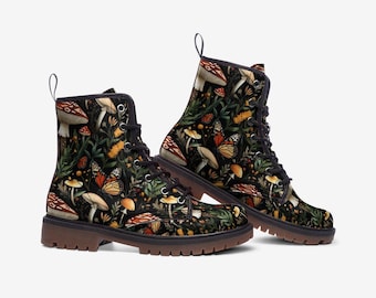 May include: Black lace-up boots with a dark background featuring a pattern of colorful mushrooms, butterflies, and foliage.